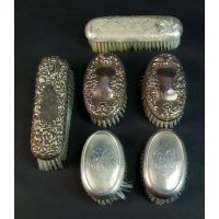 Lot 137: Sterling Brushes