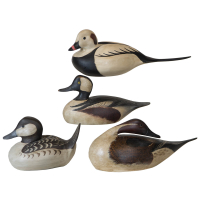 Lot 227: Four Wood Decoys